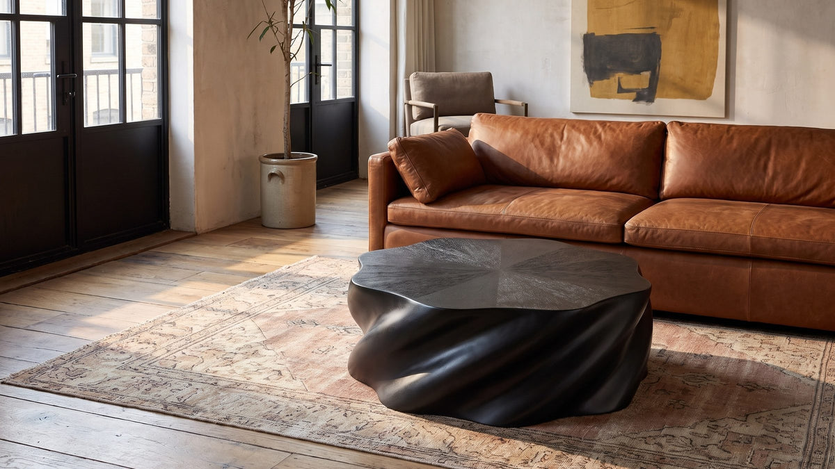 A dark form in a pale room. - Spilimbergo Black Fiberglass Twisted Petal Coffee Table