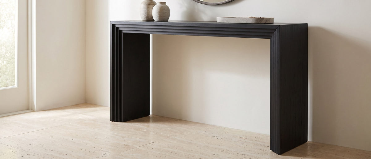 Spinazzola Black Paulownia Waterfall Console Table in the room