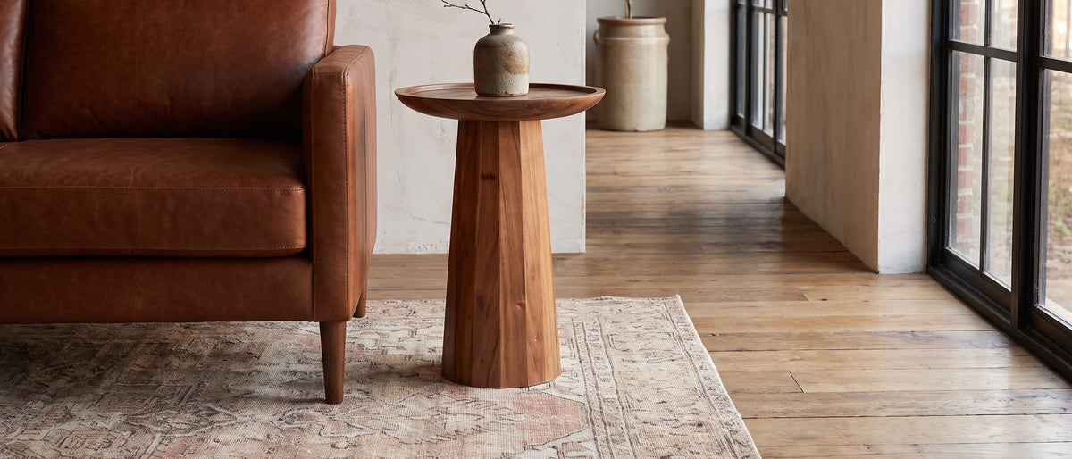 Sternatia Cognac Acacia Pedestal Side Table in the room