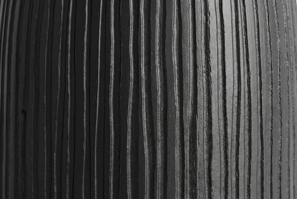 Carved lines in black mango