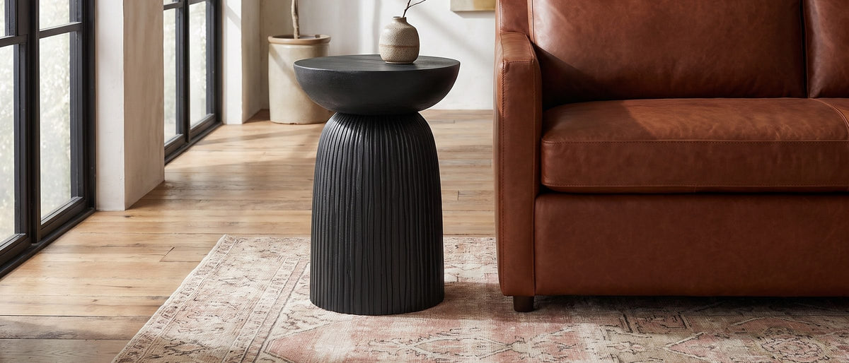 Stigliano Black Mango Bell Pedestal Side Table in the room