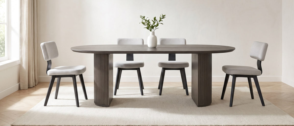 Strongoli 80-Inch Oval Fluted Pedestal Dining Set with 4 Chairs in the room