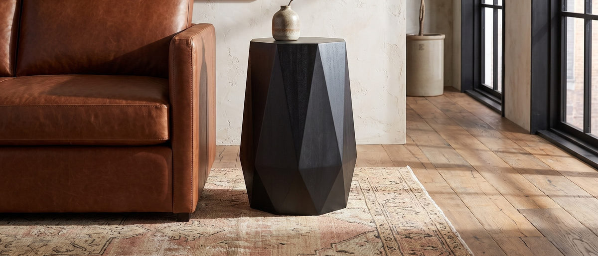 Teglio Black Acacia Faceted Octagon Side Table in the room