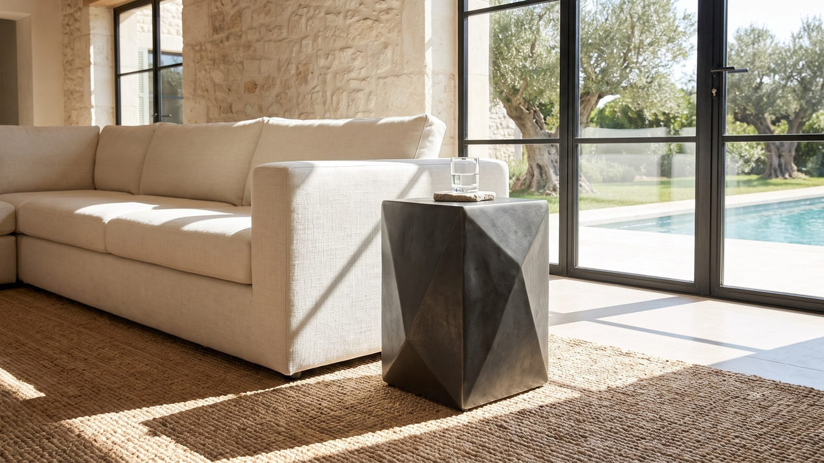 Dark metal, sharp light. - Terlizzi Graphite Cast Aluminum Faceted Side Table