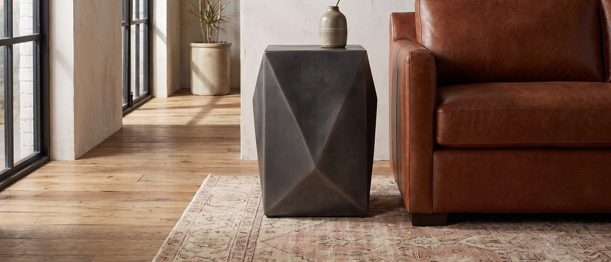 Terlizzi Graphite Cast Aluminum Faceted Side Table in the room