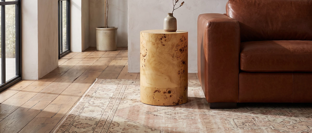 Tiriolo Natural Burl Pillar Side Table in the room