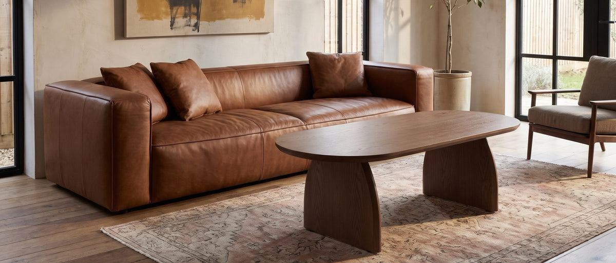Tortona 47-Inch Oval Walnut-Finish Wood Veneer Coffee Table in the room