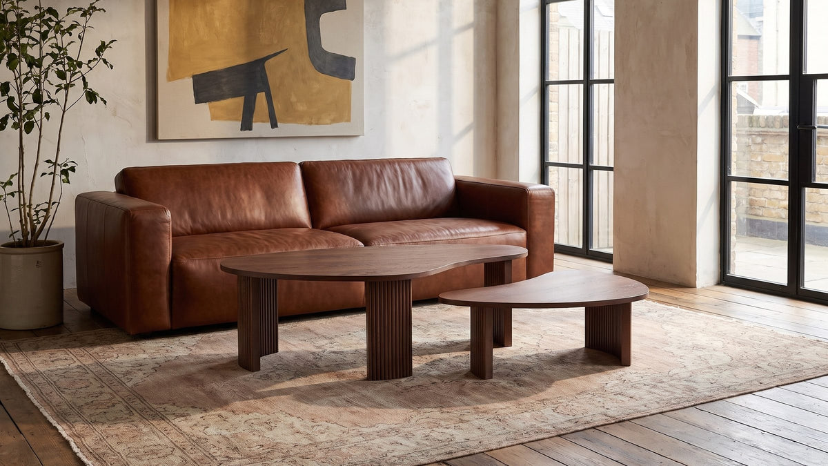 Walnut curves, cognac leather. - Valenza 50-Inch Freeform Walnut-Stained Veneer Nesting Coffee Tables, Set of 2