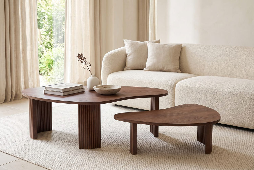The pair before a sofa