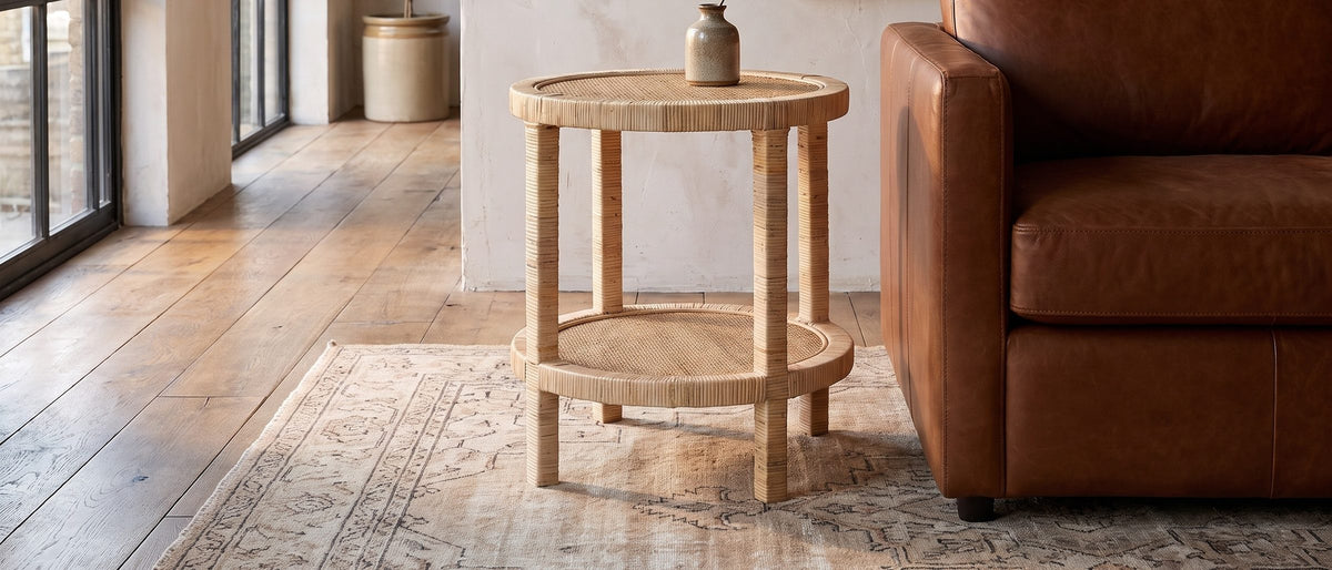 Valsinni Rattan Round Two-Tier Side Table in the room