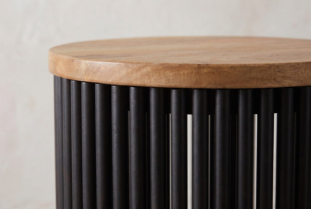 Warm wood over black metal