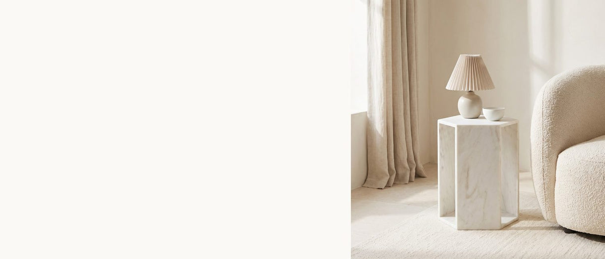 A white marble hexagon. - Vitozza White Marble Hexagon Side Table