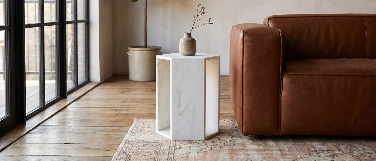 Vitozza White Marble Hexagon Side Table in the room