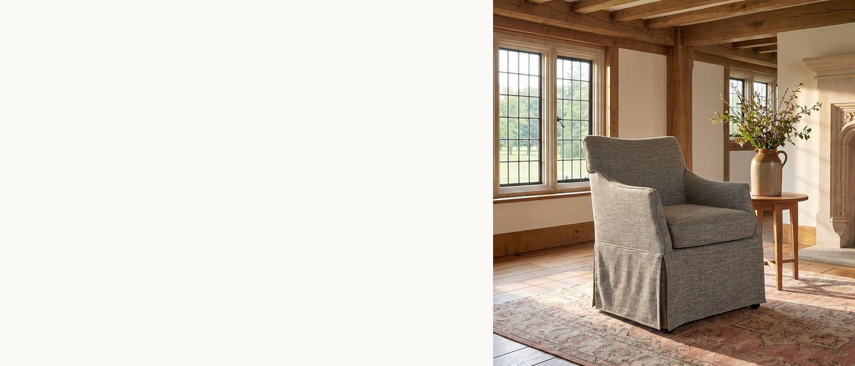 A host chair that rolls. - Zagarise Hidden-Caster Skirted Upholstered Dining Chair
