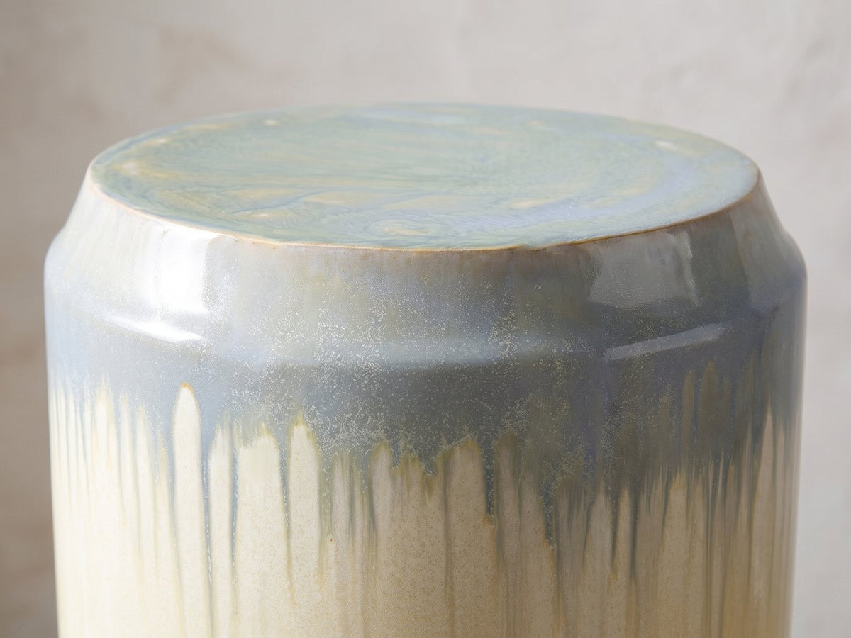Close-up of the Aradeo Reactive Glaze Ceramic Drum Side Table: the stepped top rim where the blue-grey glaze begins to drip