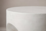 Close-up of the smooth antique white MGO lightweight concrete at the edge of the Aragona side table top