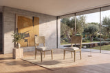 Arena Carved Geometric Back Wood Dining Chair (Set of 2) in a sunlit villa dining room