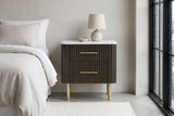 Aritzo espresso nightstand against a pale grey plaster wall in a Chicago loft bedroom with a black steel window and a concrete floor