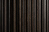 Close-up of the espresso reeds on the Aritzo nightstand: rounded vertical reeds with lighter brown grain and dark grooves between them