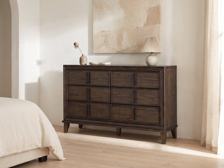 Arta 61-Inch Dark Brown 6-Drawer Dresser against a plaster wall under an abstract canvas in a bright bedroom