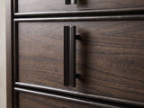 Close-up of the Arta 61-Inch Dark Brown 6-Drawer Dresser: a near-black reeded vertical pull on a moulded drawer front