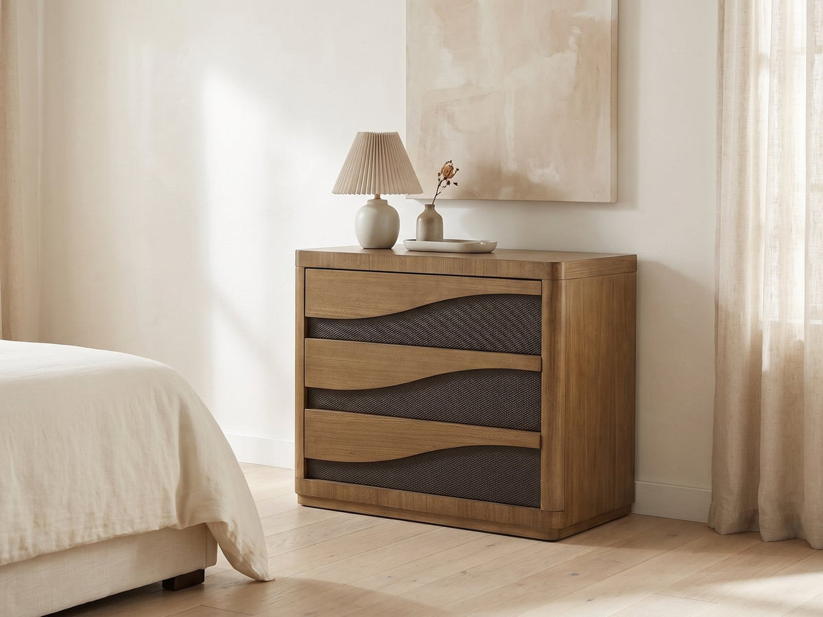 Arzignano 36-Inch Eucalyptus 3-Drawer Chest against a plaster wall under an abstract canvas in a bright bedroom