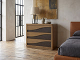 Arzignano 36-Inch Eucalyptus 3-Drawer Chest against a plaster wall in an industrial loft bedroom