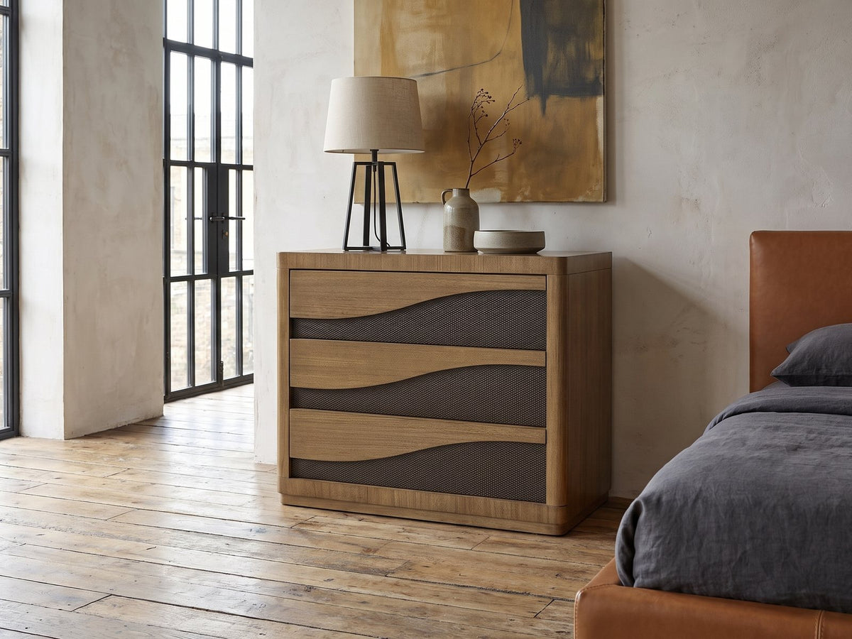 Arzignano 36-Inch Eucalyptus 3-Drawer Chest against a plaster wall in an industrial loft bedroom