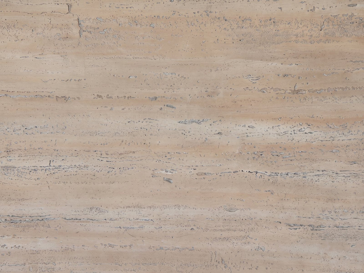 Close-up of the Asiago 40-Inch Square Faux Travertine Pyramid Pedestal Dining Table: the pitted, matte travertine-look texture of the top