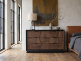 Asolo 61-Inch Walnut and Black 6-Drawer Dresser against a plaster wall in an industrial loft bedroom