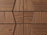 Close-up of the Asolo 61-Inch Walnut and Black 6-Drawer Dresser: the faceted walnut veneer drawer fronts, each a centre trapezoid between two slanted side pieces