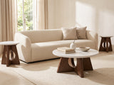 Asti 40-Inch Round White Marble Coffee and End Table Set, 3 Pieces styled with books, a vase and a stone bowl in front of a cream sofa in a bright plaster room