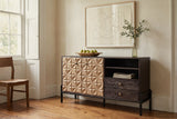 Atella sideboard against a limewashed cream plaster wall in a Savannah dining room with heart-pine floors and a large framed line drawing above it