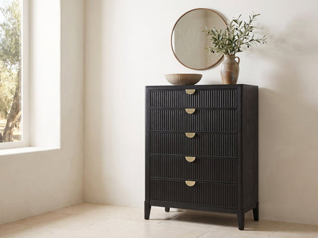 Bardolino 36-Inch Black Fluted 5-Drawer Chest under a round bronze mirror in a villa bedroom