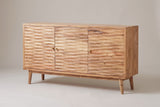 The Barile three-door sideboard in light natural wood, three-quarter view on a light studio backdrop