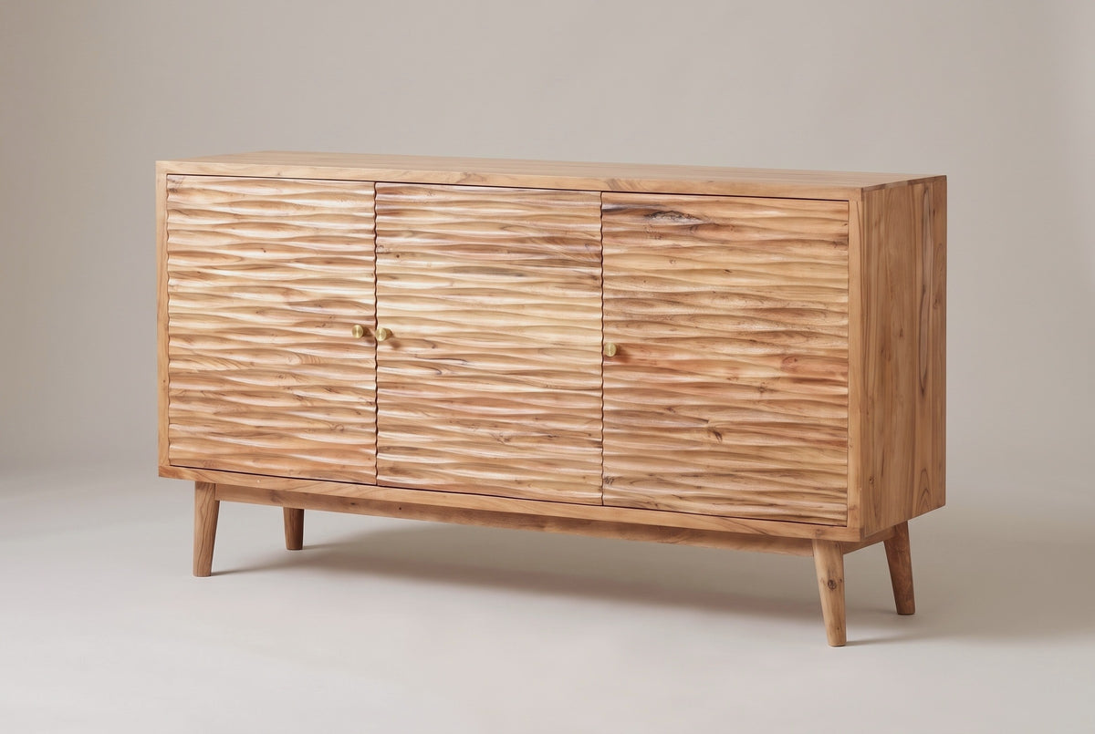 The Barile three-door sideboard in light natural wood, three-quarter view on a light studio backdrop