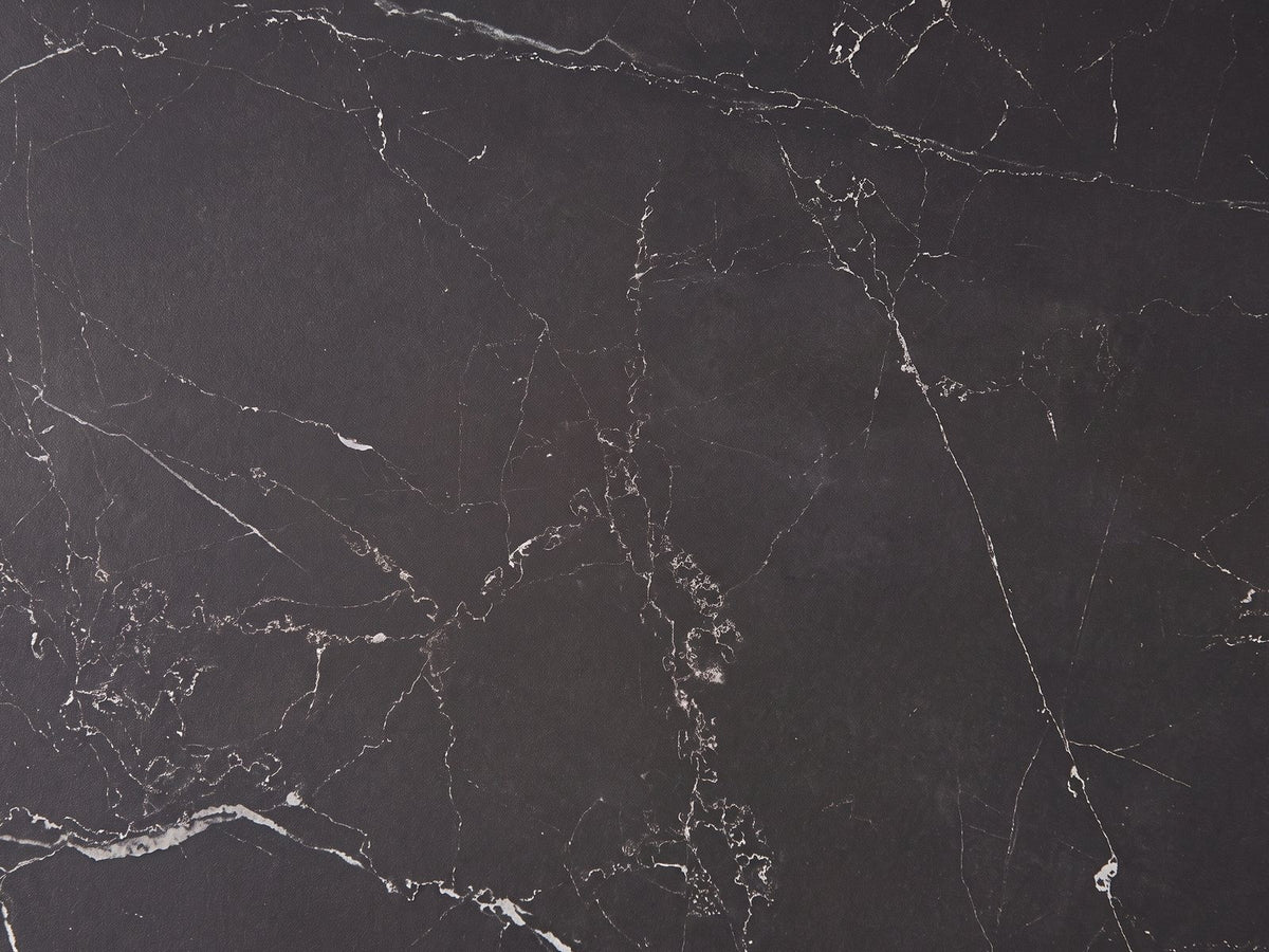 Close-up of the Barolo 35-Inch Round Black Sintered Stone Slatted Drum Coffee Table: the white veining of the matte black sintered stone top