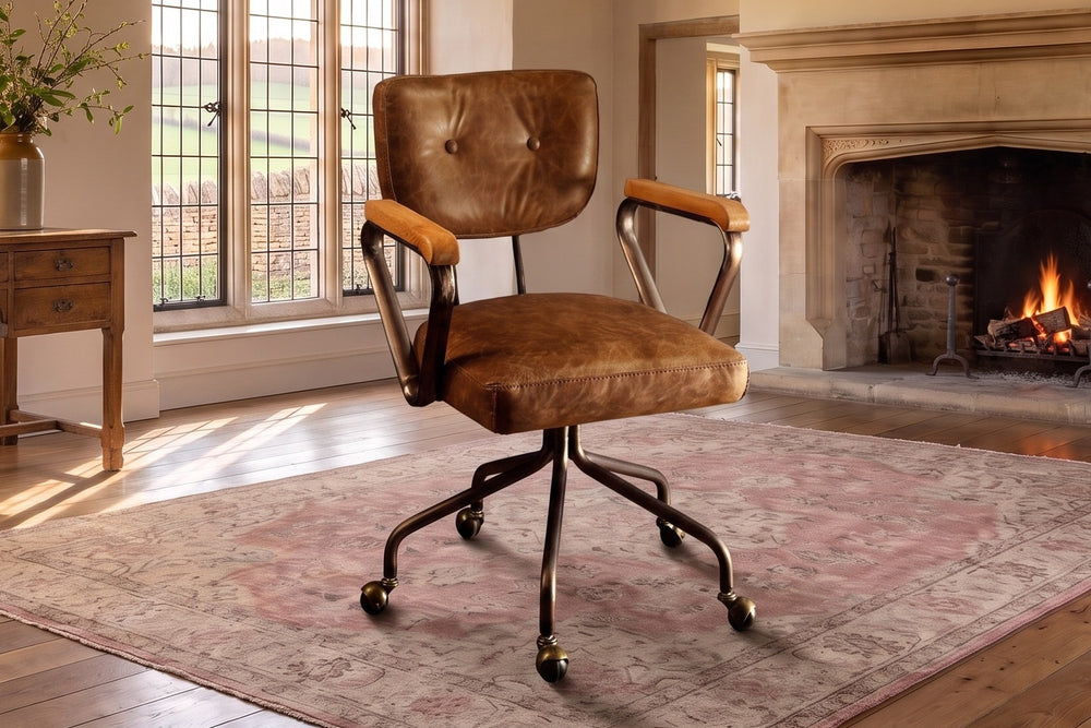 Belcastro Top-Grain Leather Swivel Desk Chair with Wood Arms in an English country study