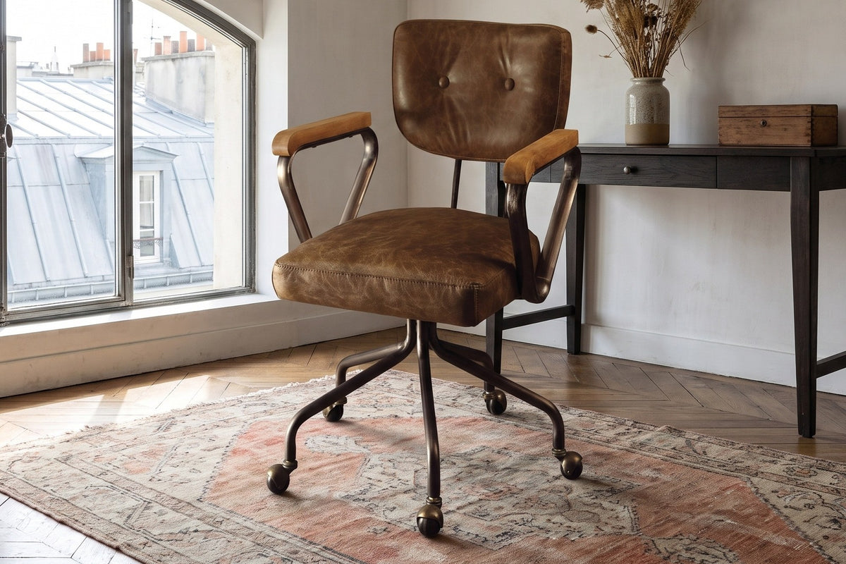 Belcastro Top-Grain Leather Swivel Desk Chair with Wood Arms in a Paris atelier