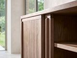 Close-up of the Belluno Solid Walnut Media Cabinet: the slatted walnut sliding doors and the shelf edge behind them