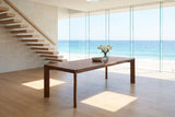 Belvedere 96-Inch Rectangular Walnut-Stained Solid Ash Dining Table in an oceanfront glass house