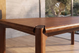 Close-up of the Belvedere 96-Inch Rectangular Walnut-Stained Solid Ash Dining Table: corner