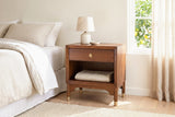 Berchidda nightstand in a Silver Lake bedroom with warm white plaster walls, linen curtains and a lemon tree outside the window