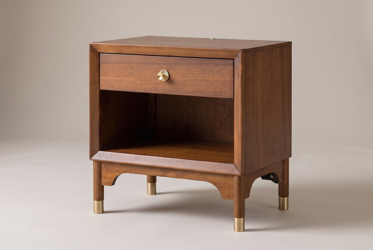The Berchidda nightstand in walnut veneer, three-quarter view on a light studio backdrop