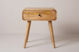 The Bonorva nightstand in light mango, front view on a light studio backdrop