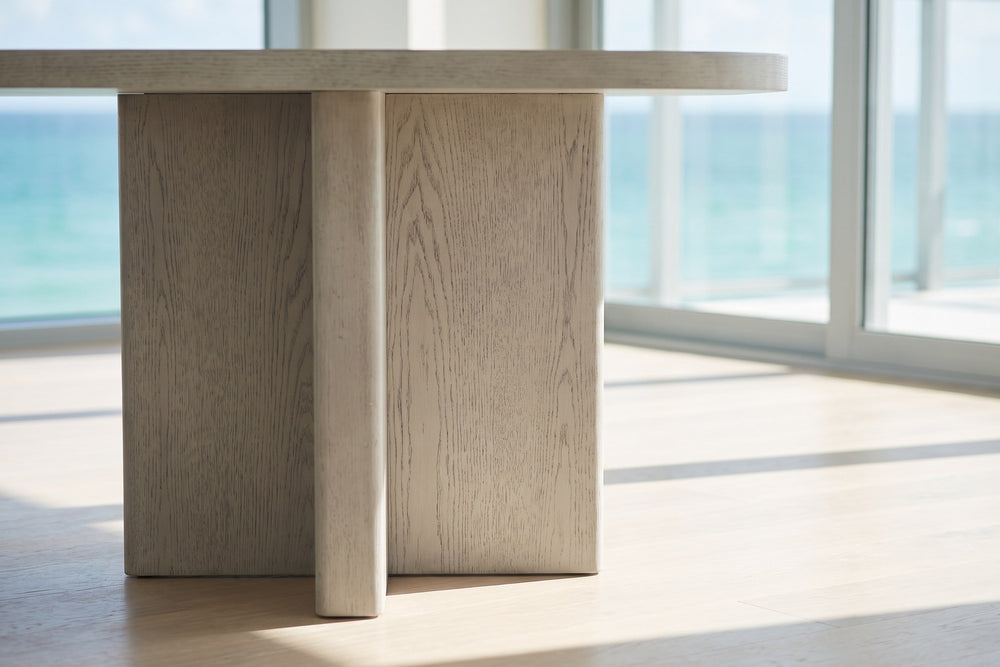 Close-up of the Bova 82-Inch Oval Grey Oak Veneer Dining Table: base