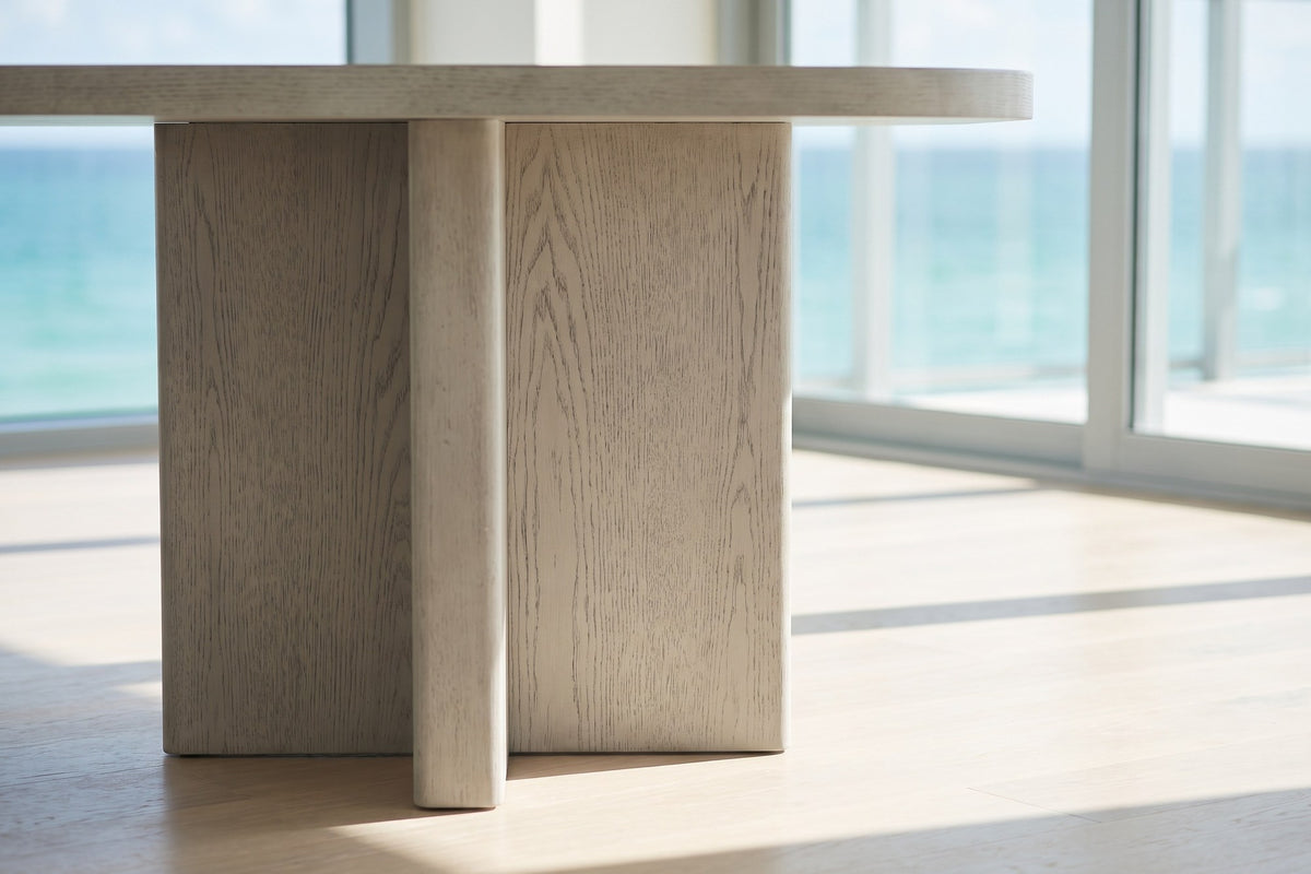 Close-up of the Bova 82-Inch Oval Grey Oak Veneer Dining Table: base