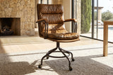 Bovalino Pillowed Top-Grain Leather Swivel Desk Chair with Wood Arms in a sunlit villa study