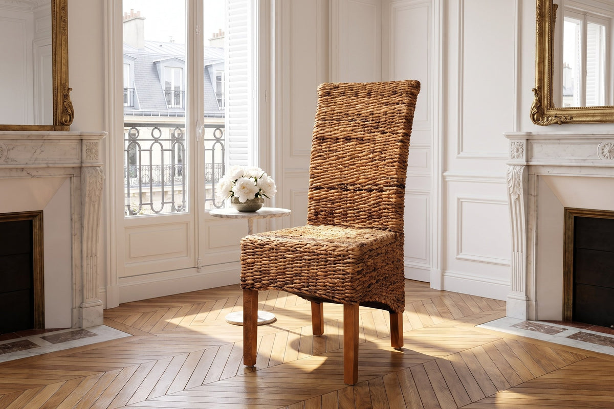 Briatico High-Back Woven Natural Fiber Dining Chair in a Paris salon