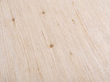 Close-up of the Brienza Reclaimed Pine Sphere-Leg Side Table: the whitewashed reclaimed pine grain of the top